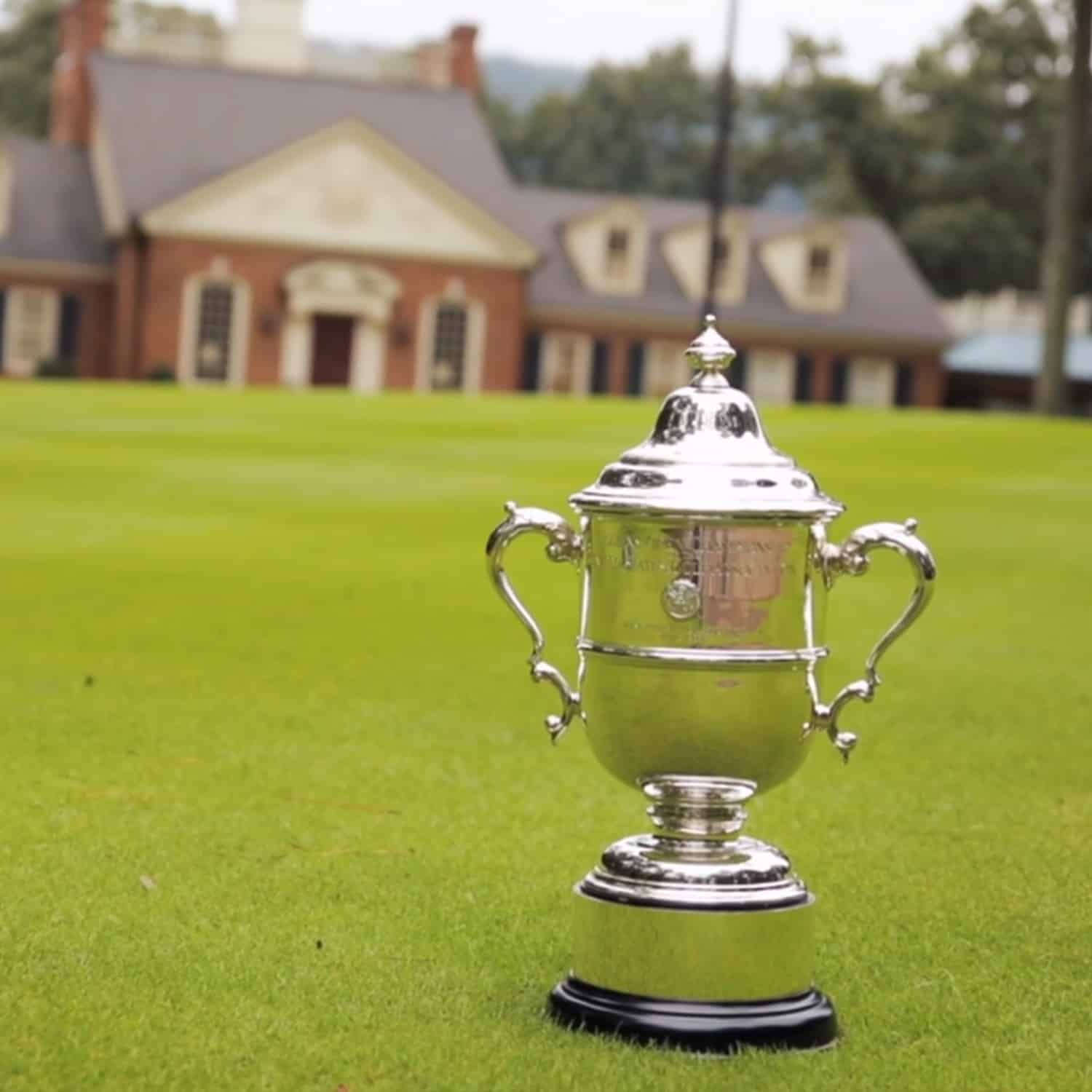 US Women's Open Trophy in front of Shoal Creek Clubhouse