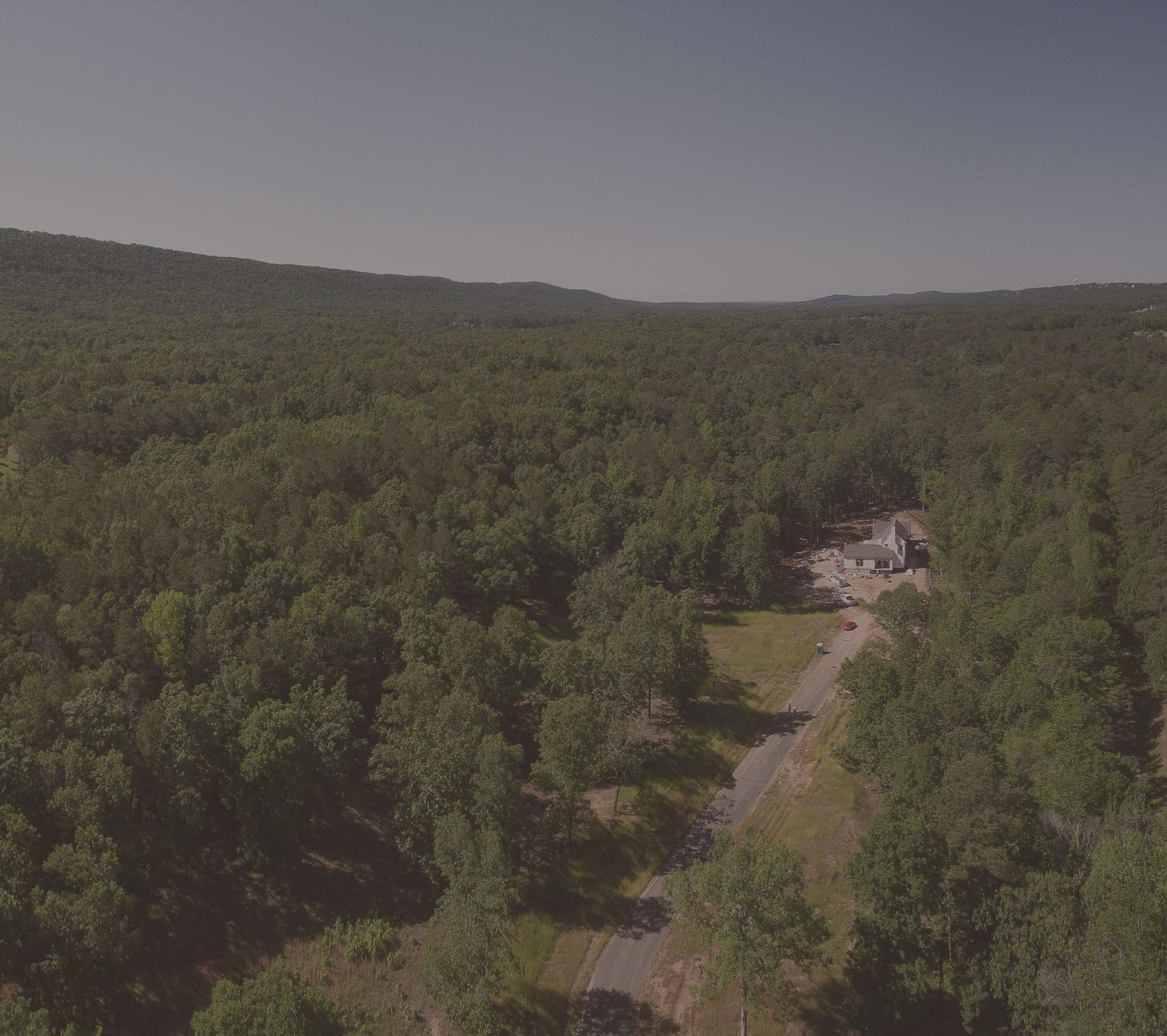 Undeveloped land with single home in Shoal Creek Community near Birmingham, AL