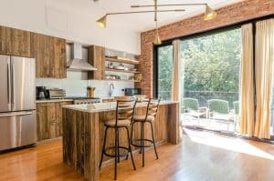 Luxury custom home kitchen with reclaimed wood