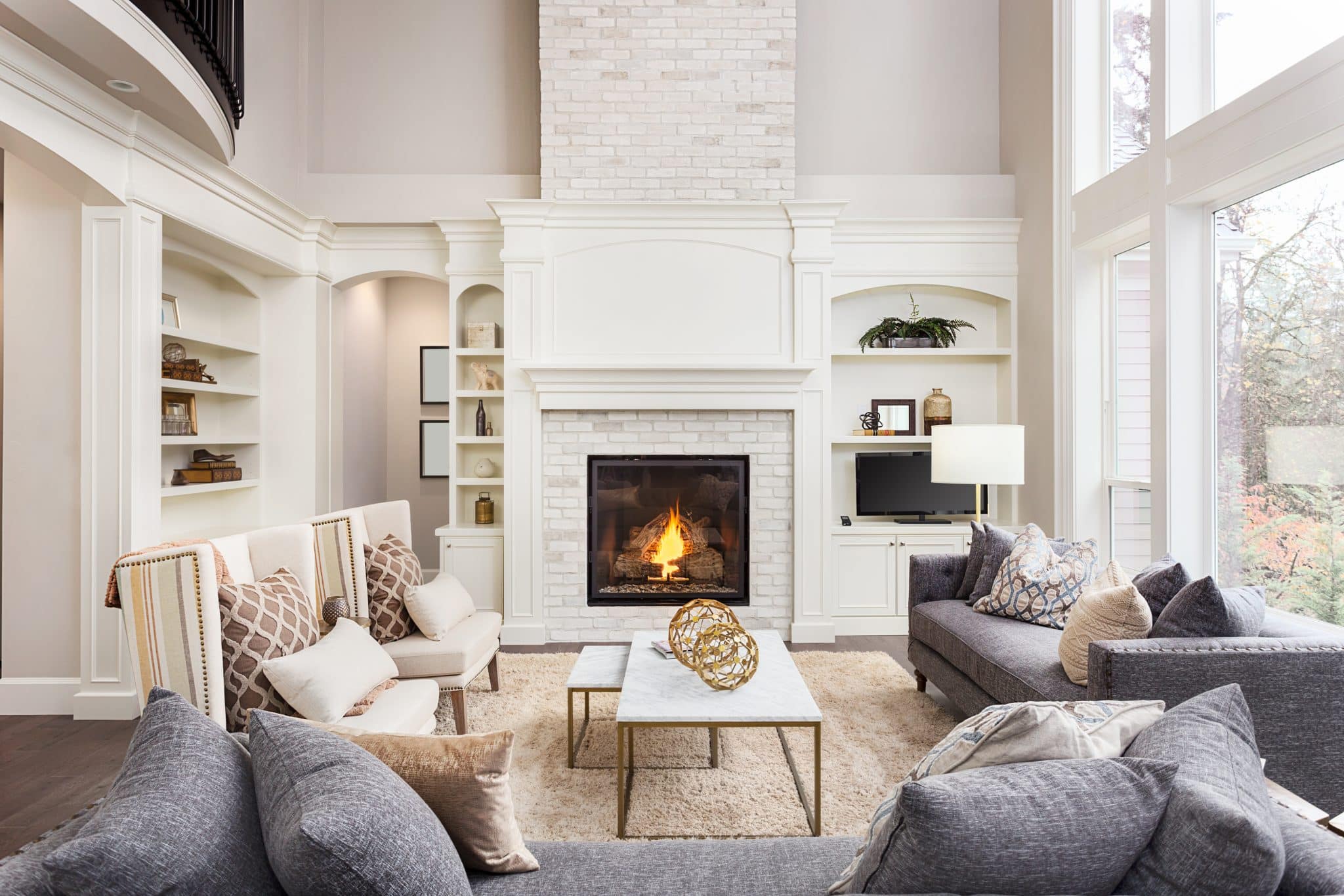 Living room in new construction luxury home following interior design guidelines