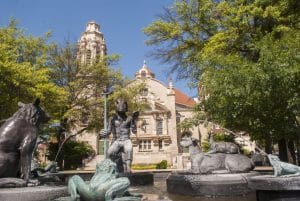 Frank Fleming's bronze sculpture, The Storyteller, known simply as "the fountain" in Five Points