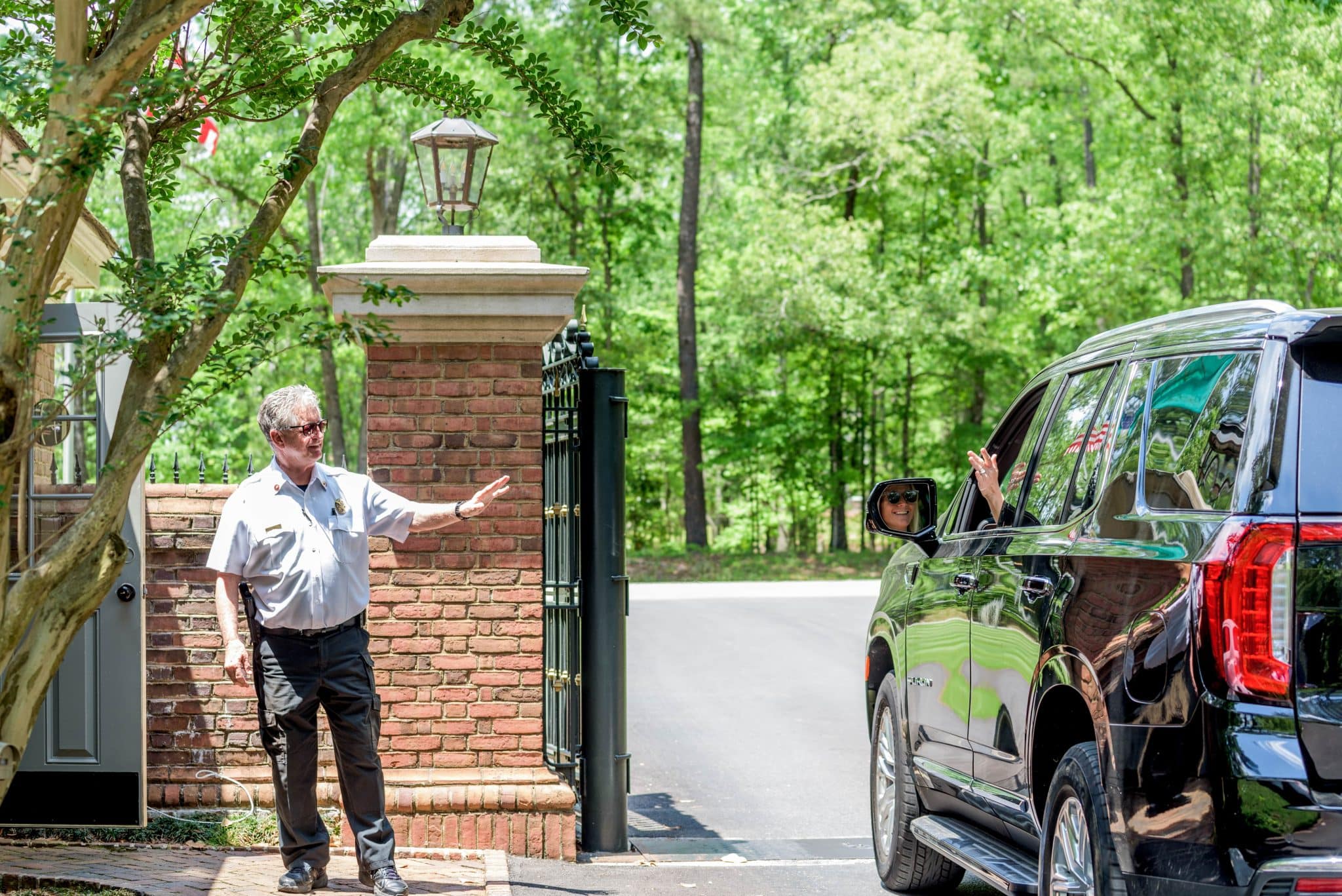 gate operator opening gates for a vehicle to enter Shoal Creek