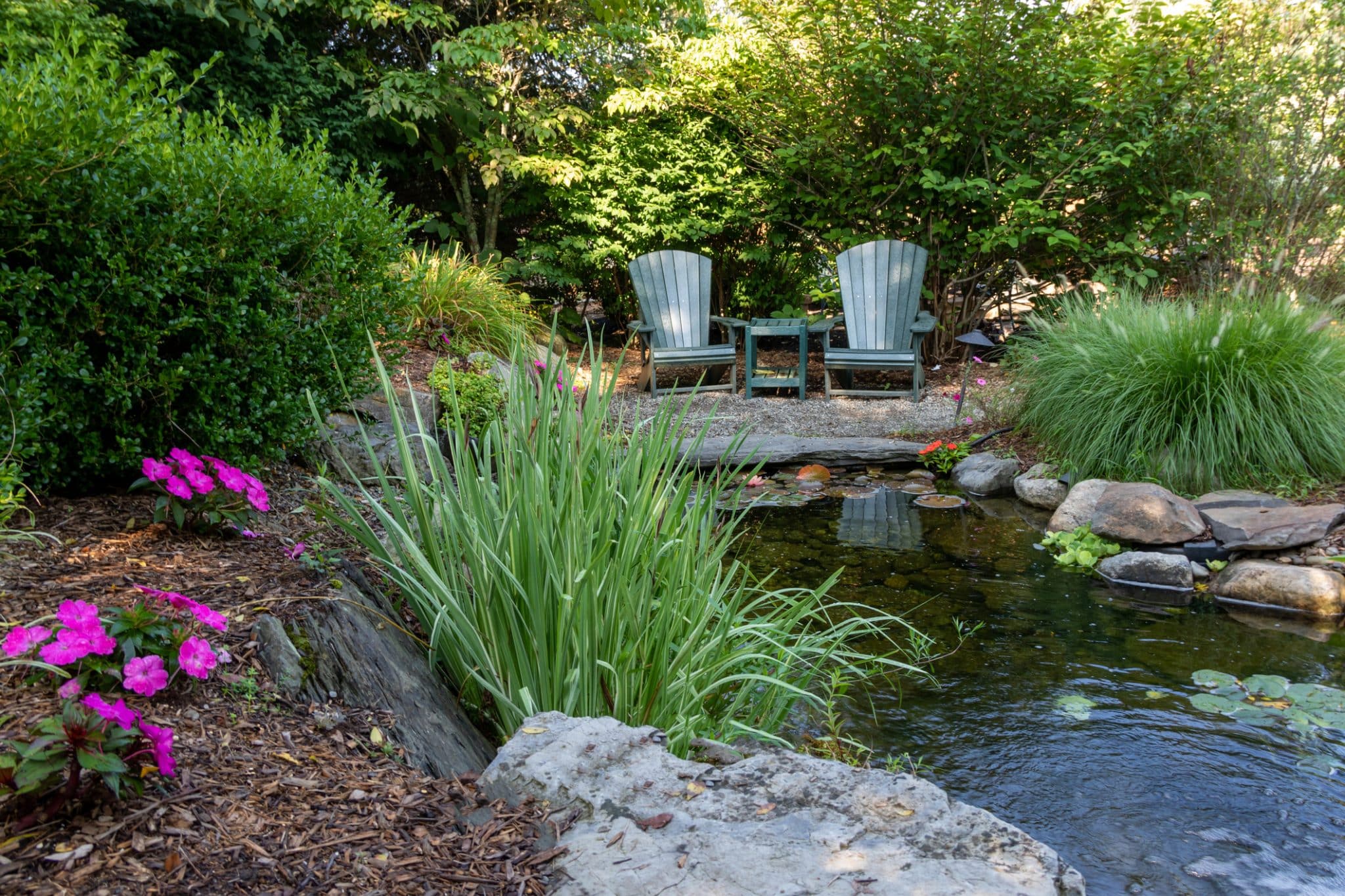 Landscape architecture for garden with water feature. Get backyard paradise ideas for your custom home.