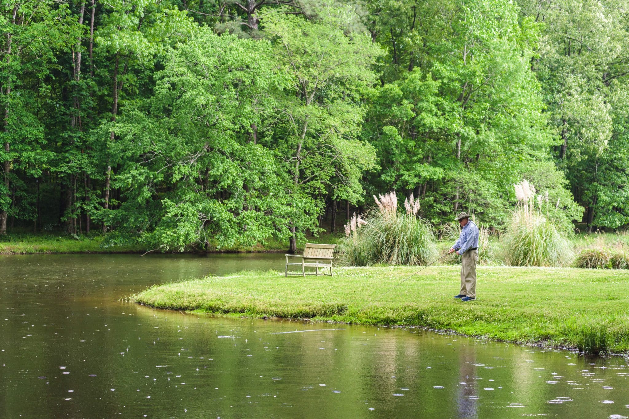 A resident fishes in one of Shoal Creek’s six lakes, a feature that makes it one of the best neighborhoods in Birmingham