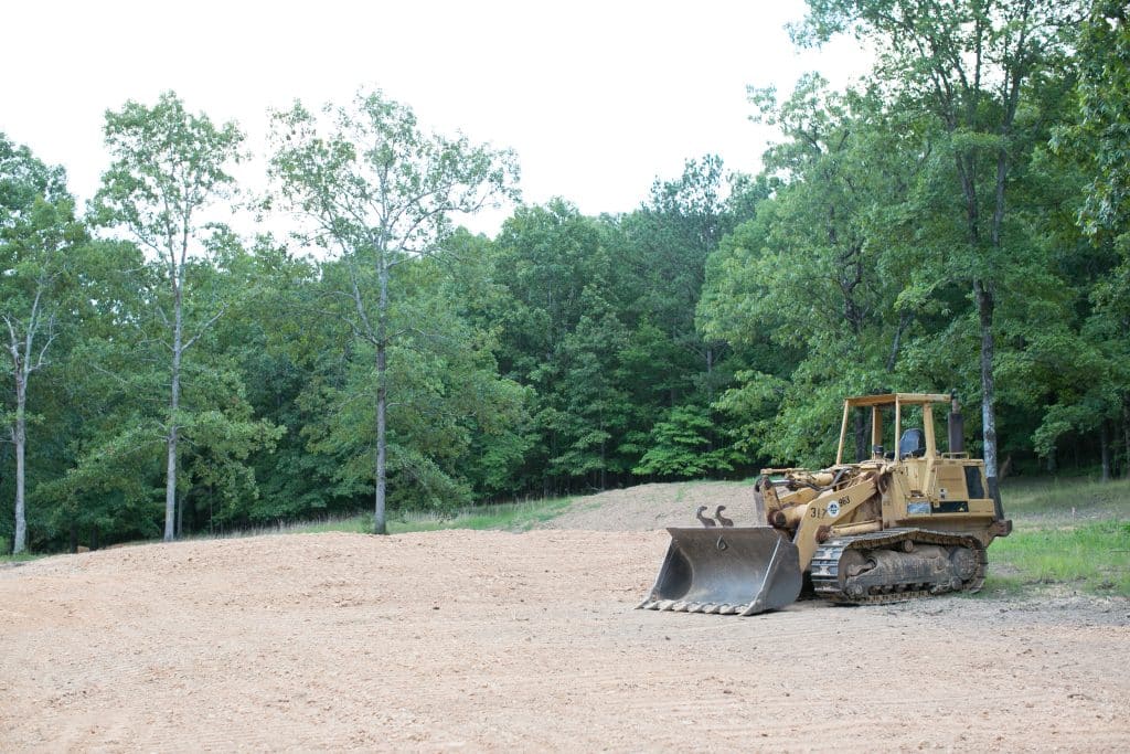A bulldozer sits on a plot of land for a new construction home in Birmingham