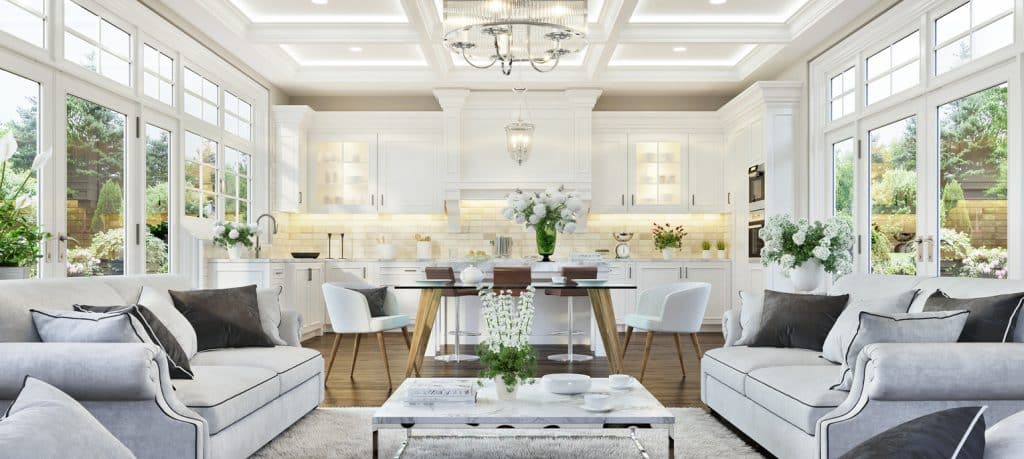 Luxurious white kitchen and living room in a beautiful custom home