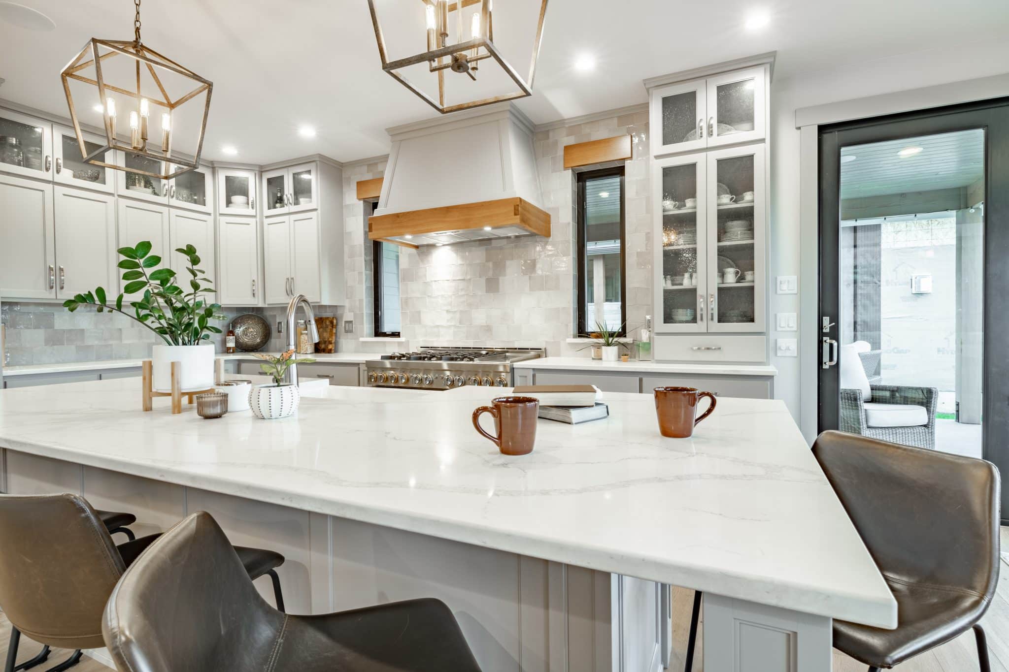 A luxury modern kitchen design with modern farmhouse inspiration