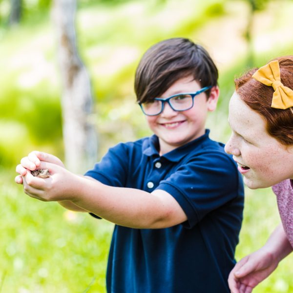 Two kids playing in the nature