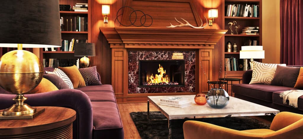 A luxury living room decorated with rich jewel tones, unusual neutrals, complimentary patters, gold accents, and wood features.